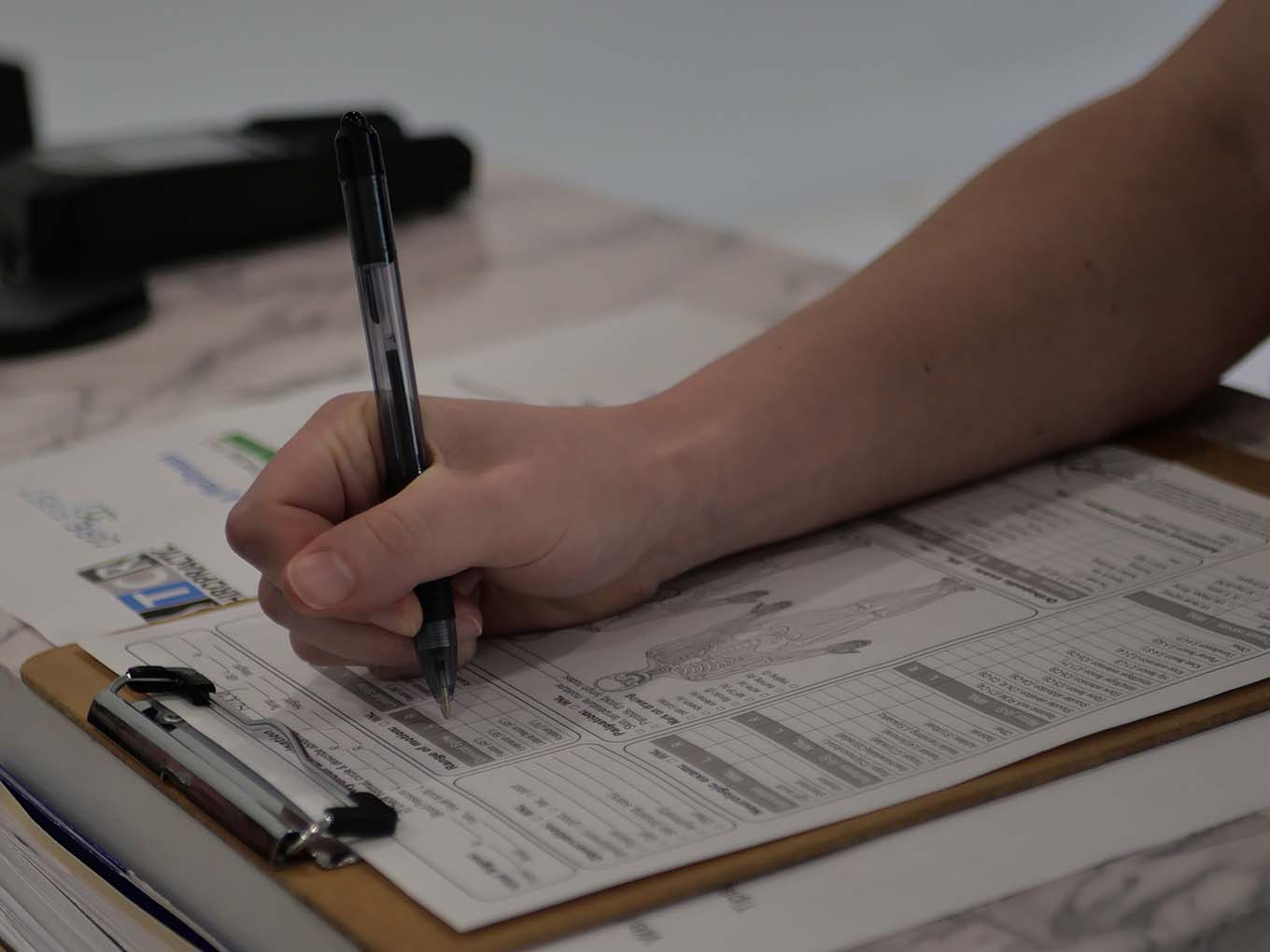 patient filling out forms